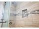 Modern shower with tile surround and a niche at 3939 Springhill Ave, Las Vegas, NV 89121