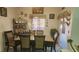 Dining room with a marble table and six chairs at 4030 Allyson Rae St, North Las Vegas, NV 89032