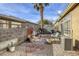 Landscaped backyard with patio, fountain, and seating area at 4773 Big Draw Dr, North Las Vegas, NV 89031