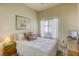 Bright bedroom with a comfortable bed and plenty of natural light at 4773 Big Draw Dr, North Las Vegas, NV 89031