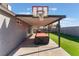 Covered patio with basketball hoop and ping pong at 4825 Greencreek Dr, Las Vegas, NV 89110