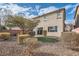 Artificial turf backyard with a view of the house at 4944 Guysborough St, Las Vegas, NV 89148