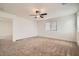 Large bedroom with ceiling fan and access to another room at 4944 Guysborough St, Las Vegas, NV 89148