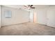 Bright bedroom featuring ceiling fan and ensuite bathroom access at 4944 Guysborough St, Las Vegas, NV 89148