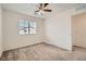 Bright bedroom with ceiling fan and window coverings at 4944 Guysborough St, Las Vegas, NV 89148