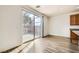 Dining area with hardwood floors and sliding glass door at 4944 Guysborough St, Las Vegas, NV 89148