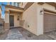 Dark brown front door with brick walkway and landscaping at 4944 Guysborough St, Las Vegas, NV 89148