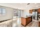 Kitchen with island, granite countertops and hardwood floors at 4944 Guysborough St, Las Vegas, NV 89148