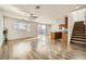 Open living room with hardwood floors and kitchen island at 4944 Guysborough St, Las Vegas, NV 89148