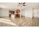 Open living room and kitchen with hardwood floors at 4944 Guysborough St, Las Vegas, NV 89148