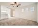 Upstairs loft area with carpet and ceiling fan at 4944 Guysborough St, Las Vegas, NV 89148