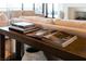 Elegant entryway with console table and books at 5 Promontory Pointe Ln, Las Vegas, NV 89135