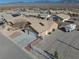 Single-story house with a two-car garage and RV parking at 5001 Ray Frank Blvd, Pahrump, NV 89060