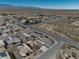 Aerial view of a house and neighborhood in a desert climate at 5001 Ray Frank Blvd, Pahrump, NV 89060