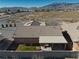 Single-story home with covered patio and fenced backyard at 5001 Ray Frank Blvd, Pahrump, NV 89060