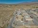 Aerial view of a house and surrounding neighborhood in a desert climate at 5001 Ray Frank Blvd, Pahrump, NV 89060