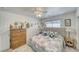 Guest bedroom with queen bed, dresser, and closet at 5001 Ray Frank Blvd, Pahrump, NV 89060