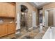 The bathroom is a calming retreat, featuring a tile shower, large vanity and a soaking tub at 51 Avenida Sorrento, Henderson, NV 89011