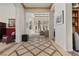 Grand foyer featuring decorative tile flooring, high ceilings, and an open floor plan, filled with natural light at 51 Avenida Sorrento, Henderson, NV 89011