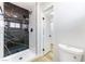 Contemporary bathroom with a black and white marble shower at 5153 Woodruff Pl, Las Vegas, NV 89120