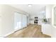 Modern kitchen with white cabinets and marble countertops at 5153 Woodruff Pl, Las Vegas, NV 89120