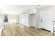 Bright laundry room with built-in shelving and white cabinets at 5153 Woodruff Pl, Las Vegas, NV 89120