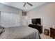 Well-lit bedroom with a large closet, ceiling fan, and neutral decor at 6 Lilla Rosa St, Henderson, NV 89011