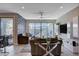 Cozy living room with pool view, neutral tones, and comfortable seating at 6 Lilla Rosa St, Henderson, NV 89011