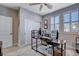 Functional home office with shutters, neutral colors, and ample desk space at 6 Lilla Rosa St, Henderson, NV 89011