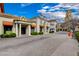 Charming retail shops with awnings and beautiful architecture line a brick-paved street at 6 Lilla Rosa St, Henderson, NV 89011