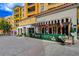 Charming street view with European-inspired architecture and inviting storefronts, and greenery at 6 Lilla Rosa St, Henderson, NV 89011