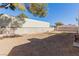 Large backyard with block wall and grassy area at 6200 Budnick Cir, Las Vegas, NV 89130