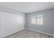 Bedroom with sliding door closet and window at 6200 Budnick Cir, Las Vegas, NV 89130