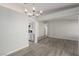 Open concept dining area with hardwood floors and view into kitchen at 6200 Budnick Cir, Las Vegas, NV 89130