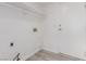 Bright laundry room with washer and dryer hookups at 6200 Budnick Cir, Las Vegas, NV 89130