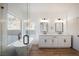 Spa-like bathroom with a freestanding tub and double sinks at 6304 Tanzanite Ave, Las Vegas, NV 89130