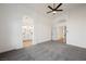 Spacious bedroom with carpet flooring and ceiling fan at 6304 Tanzanite Ave, Las Vegas, NV 89130