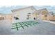 Covered patio with grassy area and gravel at 6304 Tanzanite Ave, Las Vegas, NV 89130