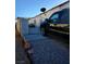 Gravel side yard with a gate and driveway access at 637 Bay Bridge Dr, North Las Vegas, NV 89032