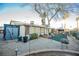 Backyard view showing shed and patio area at 6513 Hyde Ave, Las Vegas, NV 89107