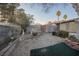 Backyard with gravel and raised flowerbeds at 6513 Hyde Ave, Las Vegas, NV 89107