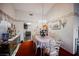 Bright dining room features a table with seating for six and a view of the kitchen at 6513 Hyde Ave, Las Vegas, NV 89107