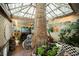 Relaxing sunroom features a large tree and skylight at 6513 Hyde Ave, Las Vegas, NV 89107