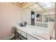 Vanity area with a large mirror and plenty of counter space at 6513 Hyde Ave, Las Vegas, NV 89107