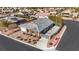 Single-story house with a gray tile roof, landscaping, and a large driveway at 6692 Radiant Red Ave, Las Vegas, NV 89130