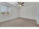 Bright bedroom featuring carpet flooring and ceiling fan at 6692 Radiant Red Ave, Las Vegas, NV 89130