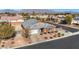 Aerial view of a single-Gathering home with manicured landscaping and a gray tile roof at 6692 Radiant Red Ave, Las Vegas, NV 89130