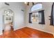 Dining area featuring hardwood floors, high ceilings, and natural light at 6712 Painted Canyon Ct, Las Vegas, NV 89130