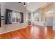 Spacious living room featuring fireplace, hardwood floors, and high ceilings at 6712 Painted Canyon Ct, Las Vegas, NV 89130