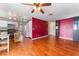 An open floor plan shows the kitchen leading into a living room with hardwood floors at 6712 Painted Canyon Ct, Las Vegas, NV 89130